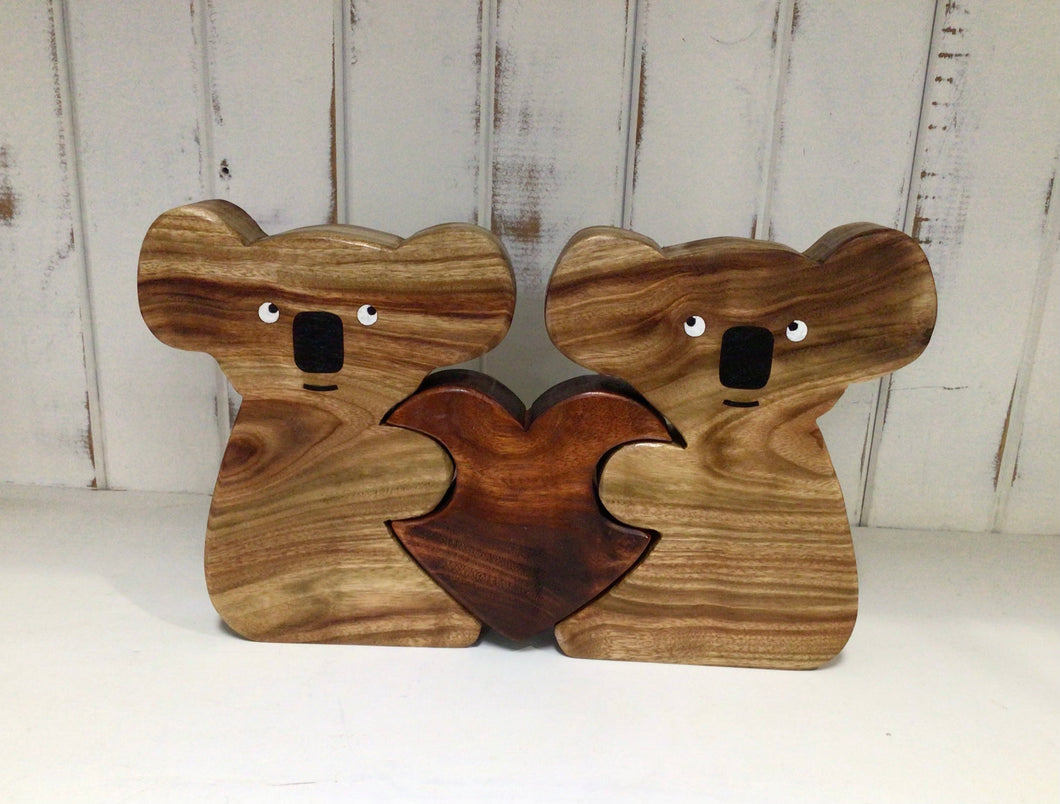 Wood carved  Animal Hearts by Nev