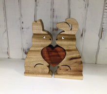 Load image into Gallery viewer, Wood carved  Animal Hearts by Nev
