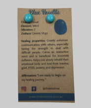 Load image into Gallery viewer, Blue Howlite earrings on a cardboard card with healing properties text

